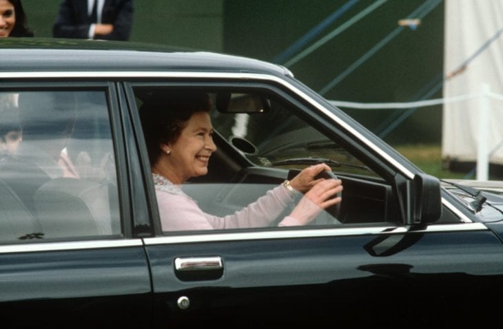 Queen Elizabeth II drives her car