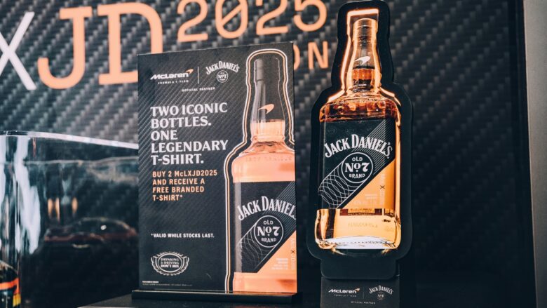 A Jack Daniel’s and McLaren promo display sits at an event booth