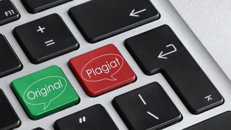 Laptop keys compare original work with plagiarized text