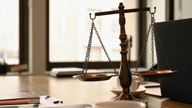 Scales of justice on a desk for child support income review