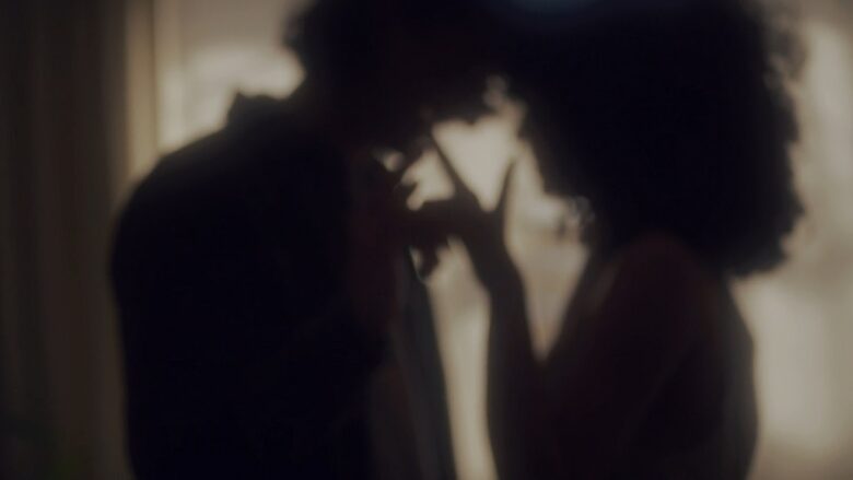 Silhouetted adult couple sharing an intimate moment while communicating about personal desires