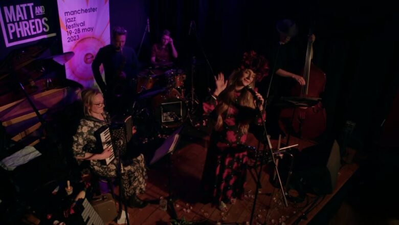 Live jazz band performs on stage at Matt and Phreds in Manchester.